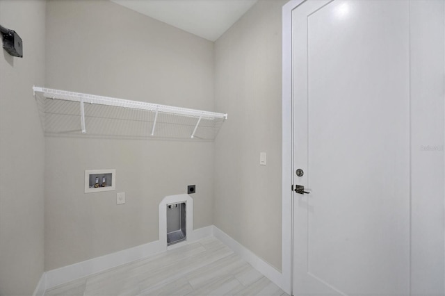 laundry room featuring hookup for a washing machine and hookup for an electric dryer