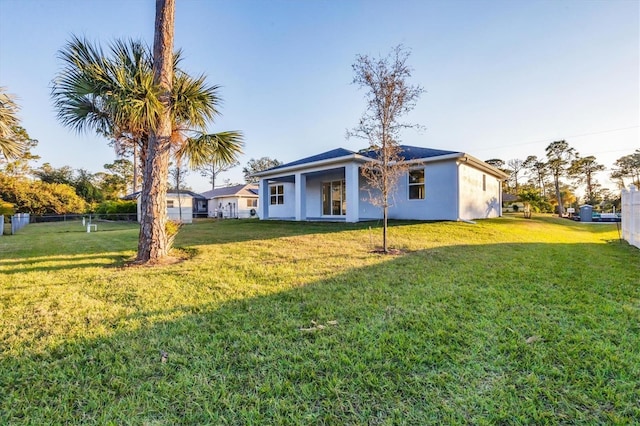 view of front of property with a front lawn