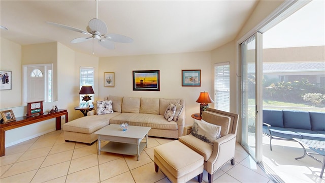 living room featuring ceiling fan and light tile patterned flooring