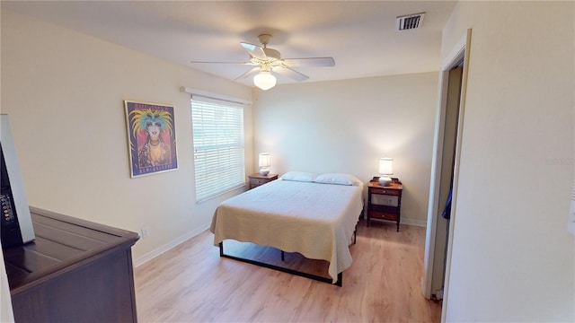 bedroom featuring ceiling fan and light hardwood / wood-style floors