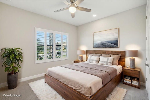 carpeted bedroom featuring ceiling fan