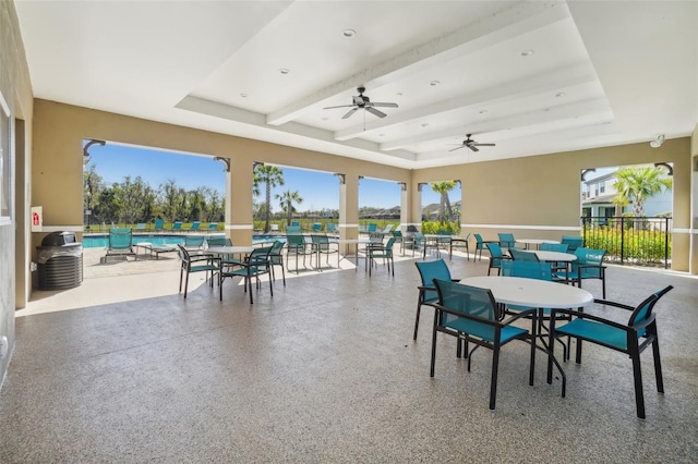 view of patio / terrace featuring ceiling fan and a community pool