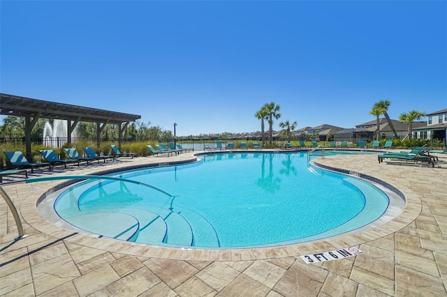 view of pool featuring a patio