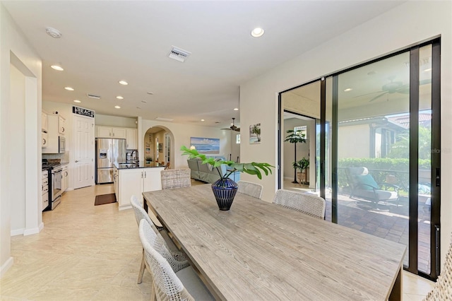 dining space featuring ceiling fan