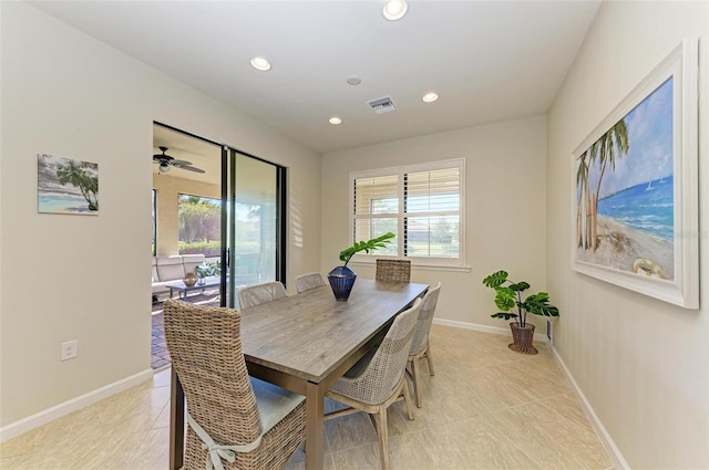 tiled dining area featuring a wealth of natural light