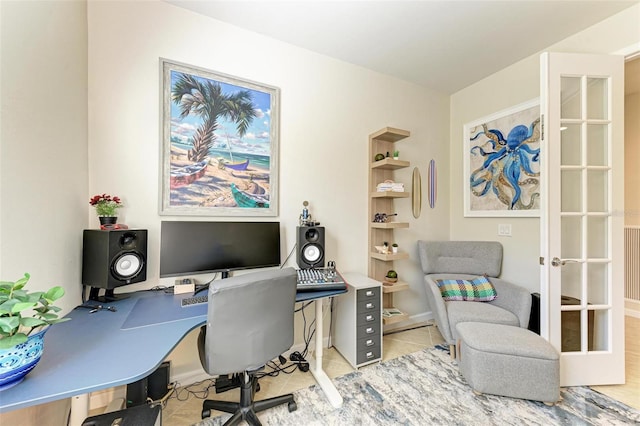 home office featuring light tile patterned floors and french doors