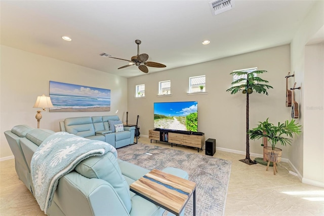 living room featuring ceiling fan