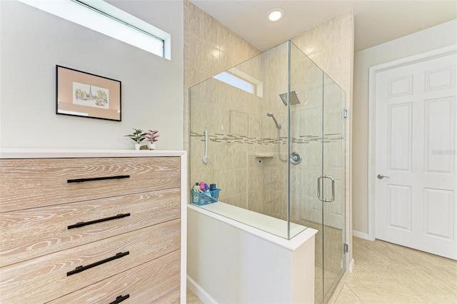 bathroom featuring an enclosed shower