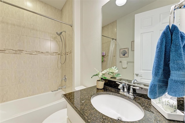 full bathroom featuring vanity, toilet, and shower / bath combo