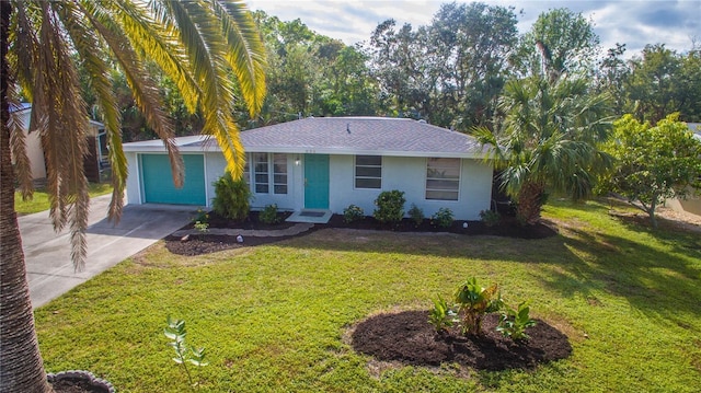 single story home with a front lawn