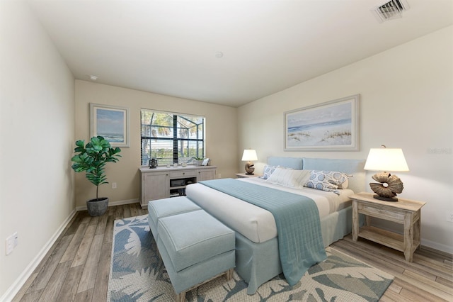 bedroom featuring light hardwood / wood-style floors