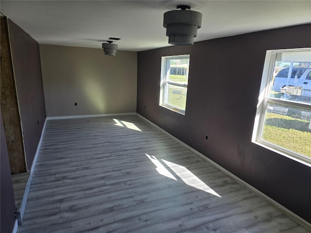 empty room featuring light hardwood / wood-style floors