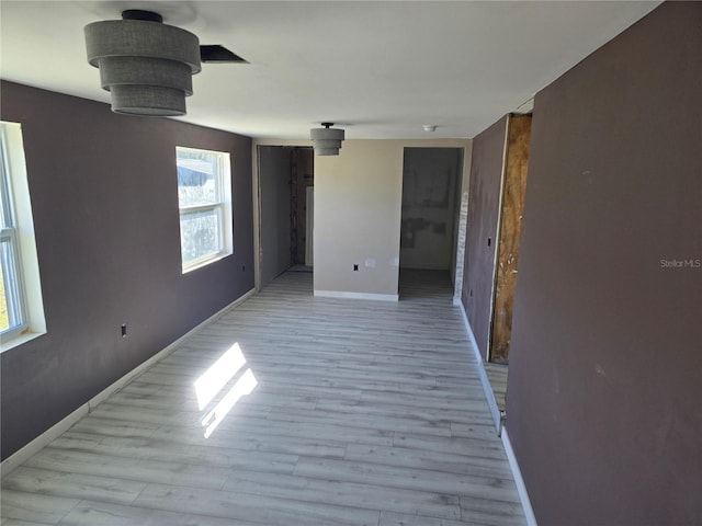 empty room with light wood-type flooring