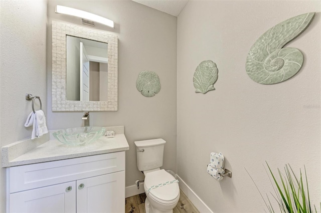 901 30th Ct E, Bradenton, FL 34208 - half bath with vanity and wood finished floors