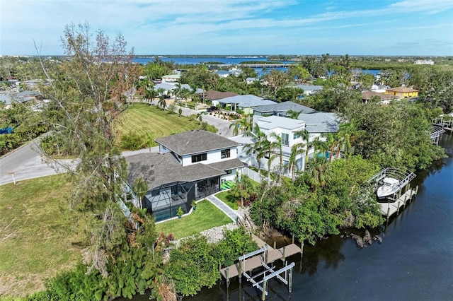 bird's eye view with a water view