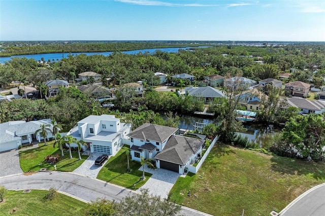 birds eye view of property featuring a water view