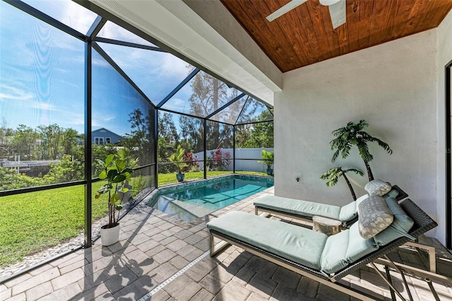 901 30th Ct E, Bradenton, FL 34208 - sunroom with a ceiling fan, a pool, and vaulted ceiling