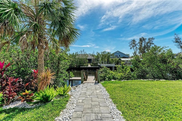 901 30th Ct E, Bradenton, FL 34208 - view of grassy yard with a boat dock