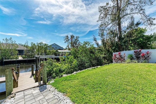 901 30th Ct E, Bradenton, FL 34208 - view of yard with a boat dock and a water view