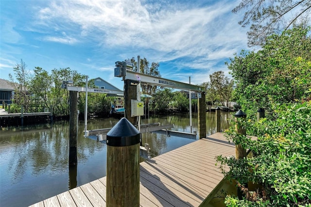 901 30th Ct E, Bradenton, FL 34208 - dock area with boat lift and a water view
