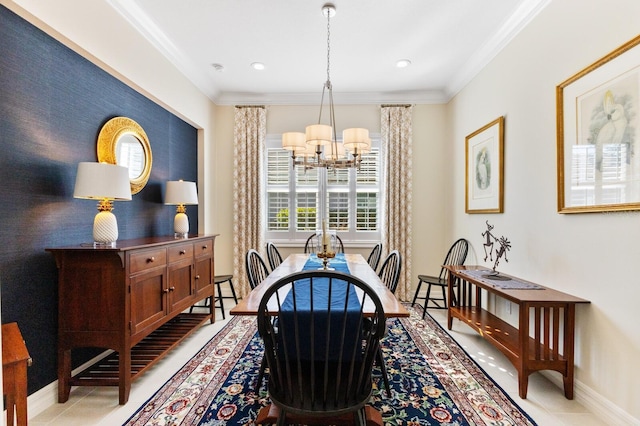 dining space featuring ornamental molding and a chandelier