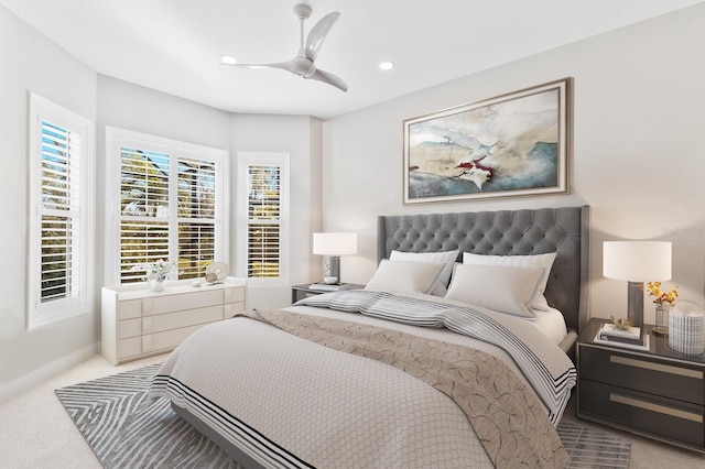 carpeted bedroom with ceiling fan