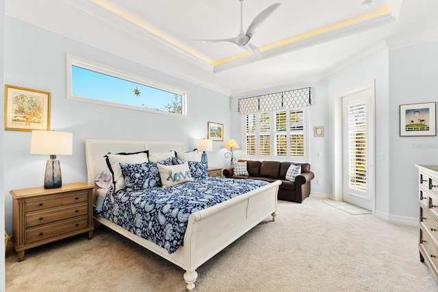 bedroom featuring access to exterior, ceiling fan, light carpet, and multiple windows