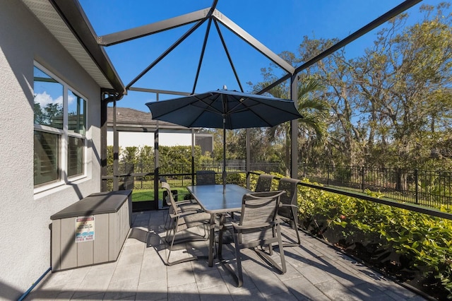 view of patio / terrace with a lanai