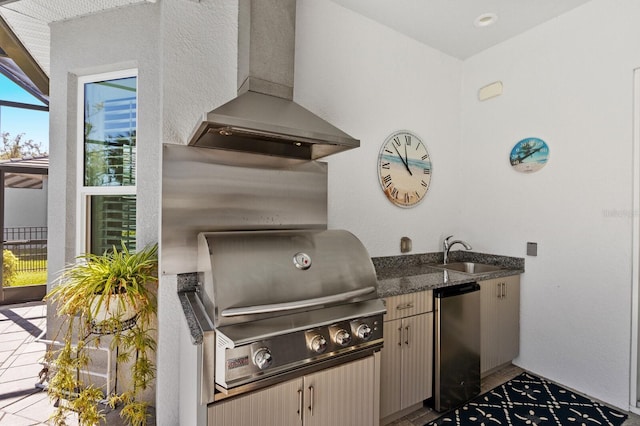 view of patio with exterior kitchen, sink, and grilling area