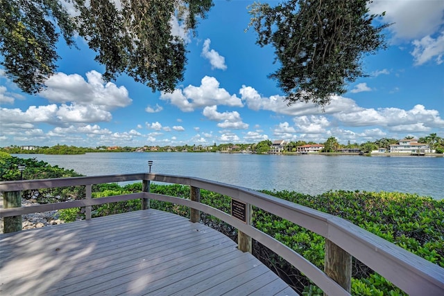 deck featuring a water view