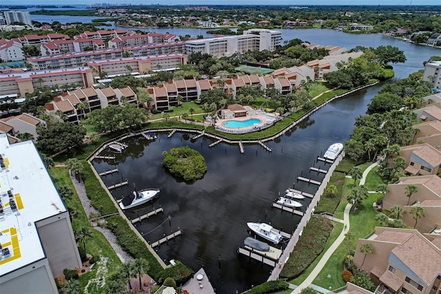 birds eye view of property featuring a water view