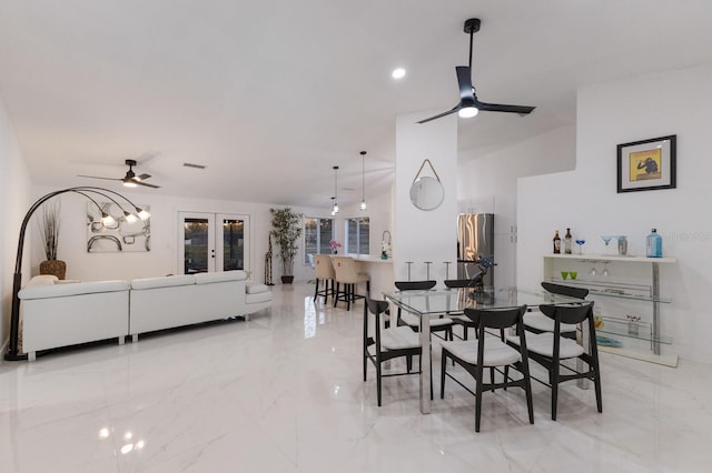 dining room featuring french doors and ceiling fan