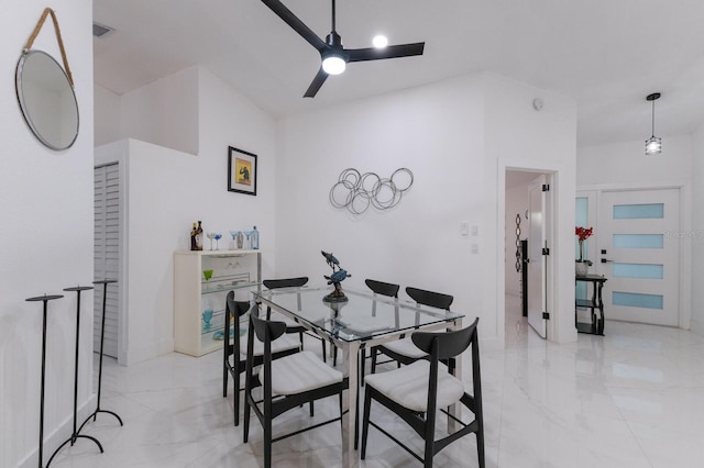 dining space with ceiling fan