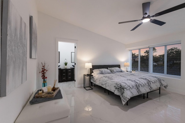 bedroom featuring ceiling fan and lofted ceiling