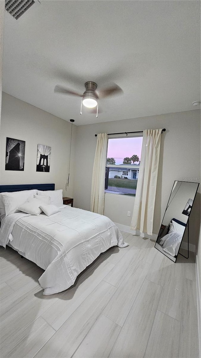 bedroom featuring ceiling fan