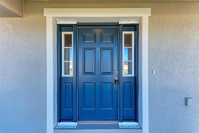 3030 58th Way E, Palmetto, FL 34221 - entrance to property featuring stucco siding