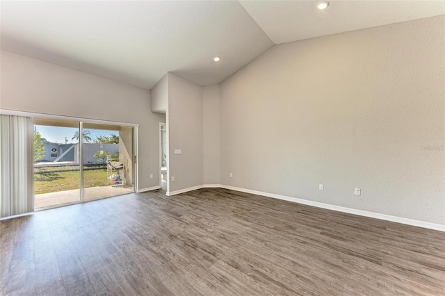 3030 58th Way E, Palmetto, FL 34221 - empty room with wood finished floors, lofted ceiling, baseboards, and recessed lighting