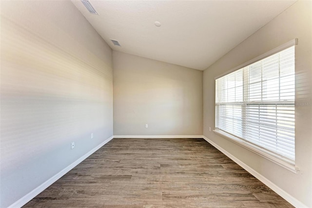3030 58th Way E, Palmetto, FL 34221 - unfurnished room with wood finished floors and baseboards