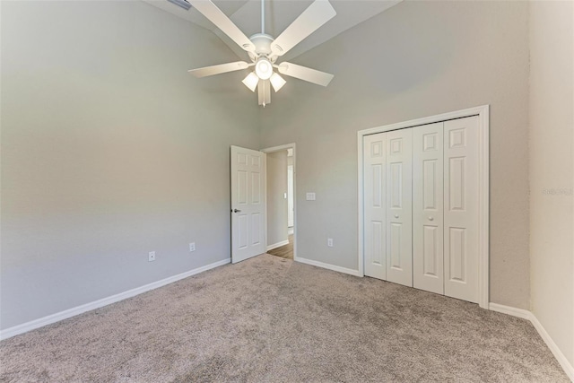 3030 58th Way E, Palmetto, FL 34221 - unfurnished bedroom featuring a high ceiling, carpet flooring, baseboards, and a closet