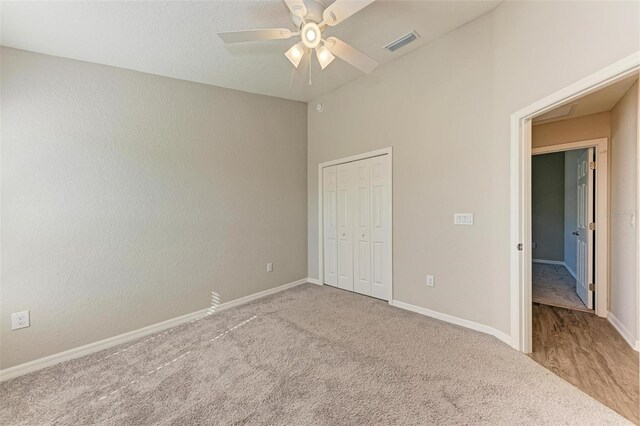 3030 58th Way E, Palmetto, FL 34221 - unfurnished bedroom with carpet flooring, a closet, and baseboards