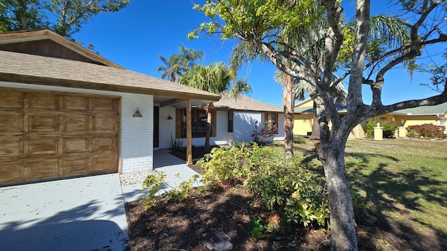 single story home with a garage