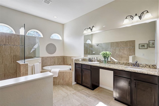 17113 1st Dr E, Bradenton, FL 34212 - bathroom with vanity and independent shower and bath