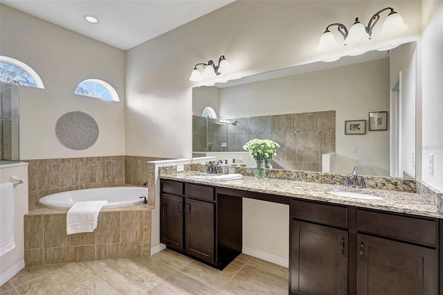 17113 1st Dr E, Bradenton, FL 34212 - bathroom featuring plus walk in shower, tile patterned flooring, and vanity