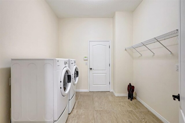 17113 1st Dr E, Bradenton, FL 34212 - laundry room featuring washing machine and dryer