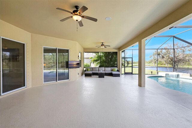 17113 1st Dr E, Bradenton, FL 34212 - view of patio / terrace with a lanai, an outdoor living space, ceiling fan, and pool water feature