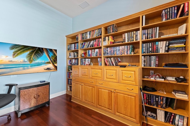 sitting room with dark hardwood / wood-style flooring