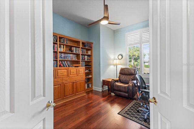 interior space featuring ceiling fan and dark wood-type flooring