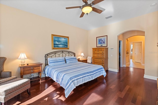 bedroom featuring ceiling fan and dark hardwood / wood-style floors