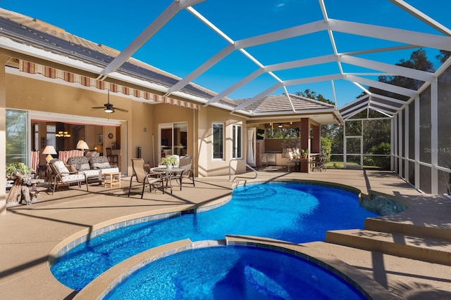 view of swimming pool featuring outdoor lounge area, ceiling fan, a lanai, an in ground hot tub, and a patio area