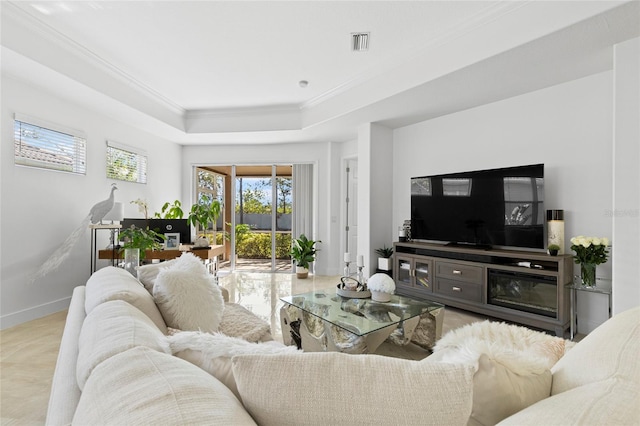 living room featuring crown molding